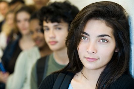 simsearch:632-03630208,k - Teenage girl waiting at front of line, portrait Foto de stock - Sin royalties Premium, Código: 632-03630155