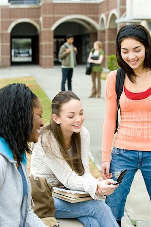 simsearch:632-01156768,k - High school friends hanging out together outside of school Stock Photo - Premium Royalty-Free, Code: 632-03630192
