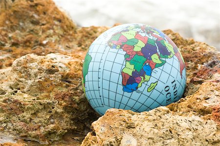 environmental conservation pictures - Globe nestled in rock Stock Photo - Premium Royalty-Free, Code: 632-03630236