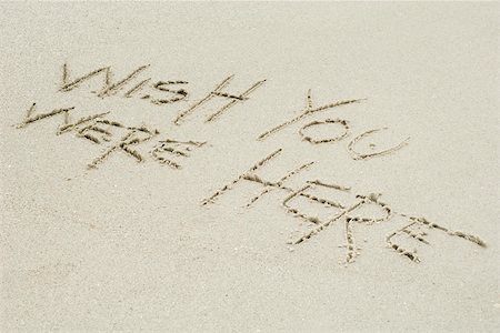 fullframe - Wish you were here written in sand Stock Photo - Premium Royalty-Free, Code: 632-03630264