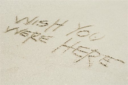 Wish you were here written in sand Stock Photo - Premium Royalty-Free, Code: 632-03630264