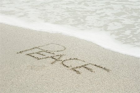 simsearch:632-03630281,k - The word "peace" written in the sand at the beach Stock Photo - Premium Royalty-Free, Code: 632-03630273