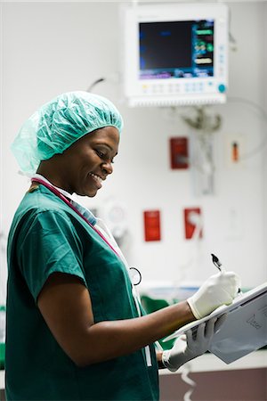 stanza d'ospedale - Nurse at work in hospital room Fotografie stock - Premium Royalty-Free, Codice: 632-03651939