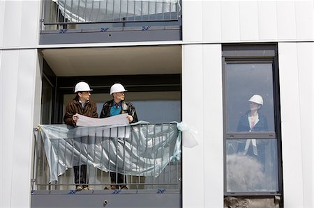 Property developer meeting with business people at building under construction Stock Photo - Premium Royalty-Free, Code: 632-03652190