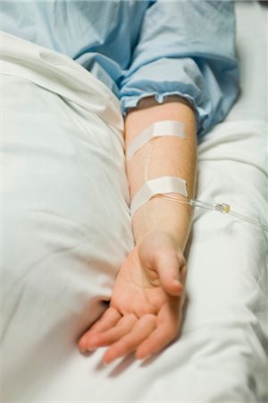 patient on iv - Patient receiving IV treatment, cropped Stock Photo - Premium Royalty-Free, Code: 632-03754381