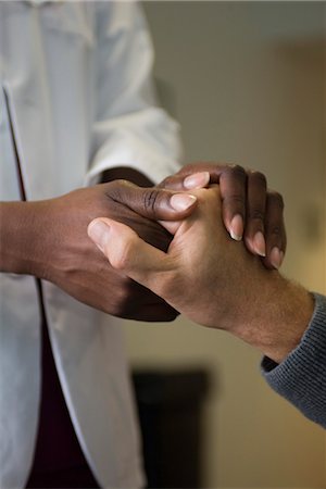 Doctor holding patient's hand Foto de stock - Sin royalties Premium, Código: 632-03754383