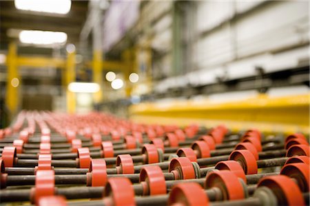 reportage style - Roller conveyor belt in carpet tile factory Stock Photo - Premium Royalty-Free, Code: 632-03754557