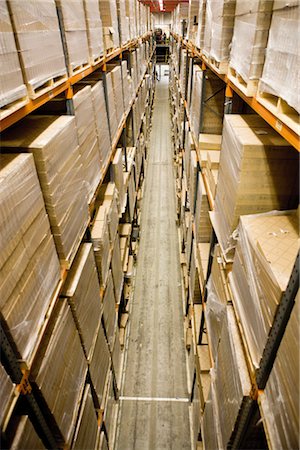 Warehouse filled with stacked pallets of cardboard boxes, elevated view Stock Photo - Premium Royalty-Free, Code: 632-03754573