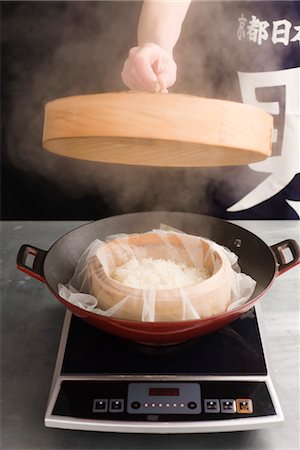 fornellino elettrico - Steaming glutinous rice Fotografie stock - Premium Royalty-Free, Codice: 632-03754658