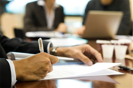 executive meeting - Executive signing document, cropped Stock Photo - Premium Royalty-Free, Code: 632-03754695