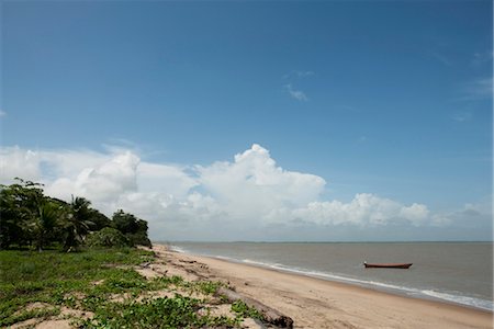 row boat canoe - Beach scene, Amazonia, French Guiana, South America Stock Photo - Premium Royalty-Free, Code: 632-03779488