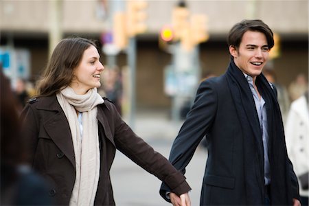 pedestrians walking - Couple walking hand in hand Stock Photo - Premium Royalty-Free, Code: 632-03779656