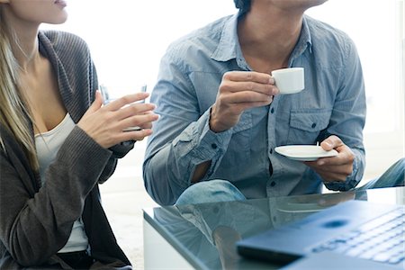 Couple relaxing together with drinks Stock Photo - Premium Royalty-Free, Code: 632-03779767