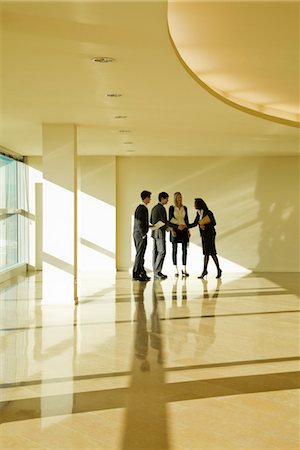 female salute - Business associates shaking hands Stock Photo - Premium Royalty-Free, Code: 632-03779787