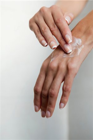 simsearch:632-01158602,k - Woman moisturizing hands, cropped Stock Photo - Premium Royalty-Free, Code: 632-03847742