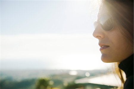 pensive woman profile - Woman wearing sunglasses, portrait Stock Photo - Premium Royalty-Free, Code: 632-03847756