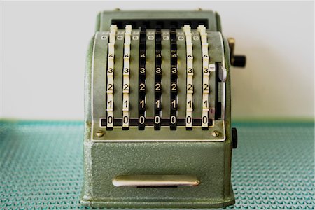 Antique adding machine Stock Photo - Premium Royalty-Free, Code: 632-03847829