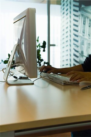 study (room) - Person using desktop computer in home office Stock Photo - Premium Royalty-Free, Code: 632-03847884