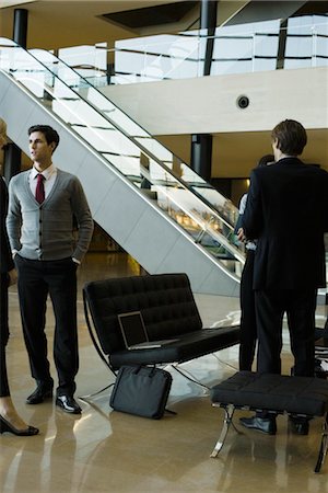 simsearch:632-03847867,k - Executives talking in lobby after meeting Stock Photo - Premium Royalty-Free, Code: 632-03847928