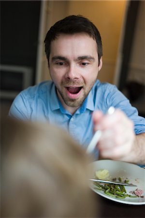 dad feeding child - Father feeding young child, cropped Stock Photo - Premium Royalty-Free, Code: 632-03848294