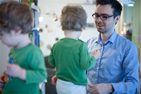 dressing mirror - Father helping toddler son get dressed Stock Photo - Premium Royalty-Free, Code: 632-03848313