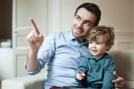 father and son on sofa - Father and young son, portrait Stock Photo - Premium Royalty-Free, Code: 632-03848375