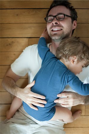 dad hug - Father and toddler son embracing, portrait Stock Photo - Premium Royalty-Free, Code: 632-03848398