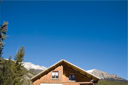 Chalet against blue sky, cropped Stock Photo - Premium Royalty-Free, Code: 632-03897825