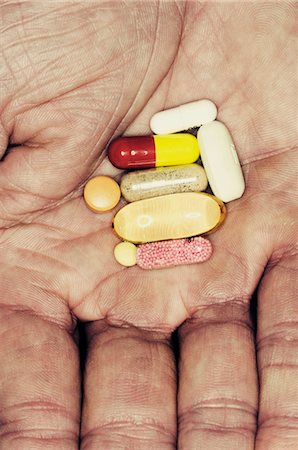 simsearch:6102-06470932,k - Assorted pills in man's hand Stock Photo - Premium Royalty-Free, Code: 632-03897968