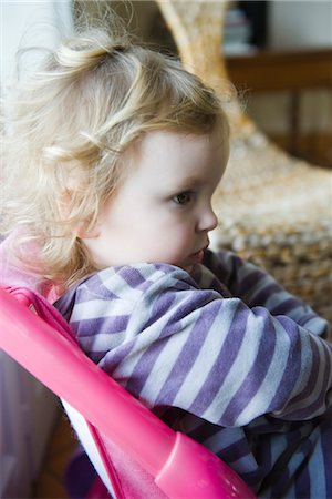 Toddler girl pouting, side view Stock Photo - Premium Royalty-Free, Code: 632-03897976