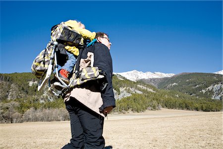 simsearch:632-03897927,k - Father hiking with baby in backpack carrier Stock Photo - Premium Royalty-Free, Code: 632-03897988