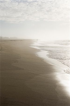 simsearch:632-03630281,k - Person walking along beach in the distance Stock Photo - Premium Royalty-Free, Code: 632-03898135