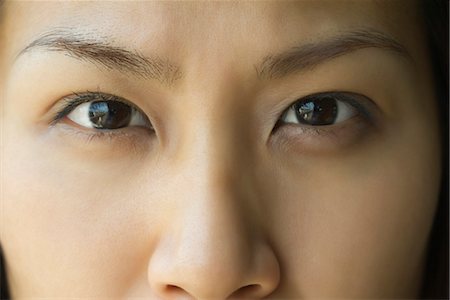 eyes and nose - Face of woman, cropped Stock Photo - Premium Royalty-Free, Code: 633-05401431