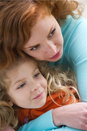 simsearch:633-05401631,k - Mother embracing young daughter Stock Photo - Premium Royalty-Free, Code: 633-05401631