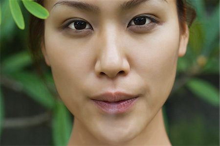 smoking women - Young woman blowing cigarette smoke Stock Photo - Premium Royalty-Free, Code: 633-05401671