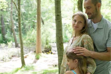 simsearch:633-05401448,k - Family relaxing together in woods, portrait Stock Photo - Premium Royalty-Free, Code: 633-05401958