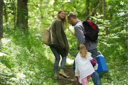 Family hiking in woods Stock Photo - Premium Royalty-Free, Code: 633-05401981