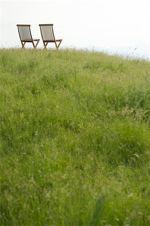 silla de playa - EmZSy chairs on top of hill Foto de stock - Sin royalties Premium, Código: 633-05402083