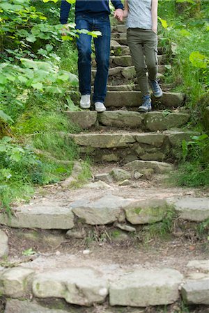 descend - Couple walking down stone steps in woods Stock Photo - Premium Royalty-Free, Code: 633-05402205