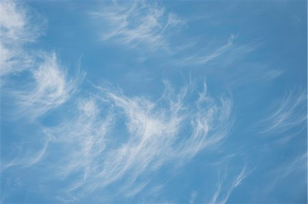 simsearch:633-06406753,k - Wispy clouds in blue sky Stock Photo - Premium Royalty-Free, Code: 633-06322325