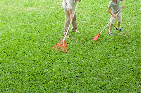 father child yard not illustration not business not vintage not 20s not 30s not 40s not 70s not 80s - Father and daughter raking yard together Stock Photo - Premium Royalty-Free, Code: 633-06355046