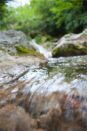 Water flowing over rocks, close-up Stock Photo - Premium Royalty-Free, Code: 633-06406425