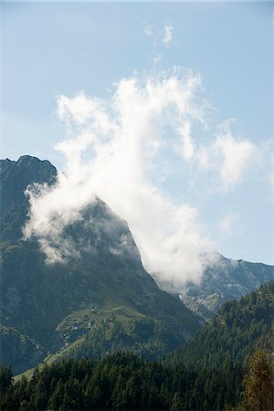 simsearch:633-06406753,k - Wispy cloud over mountain landscape Stock Photo - Premium Royalty-Free, Code: 633-06406721