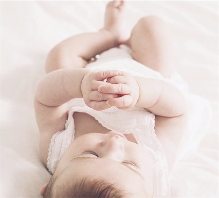 Baby lying on back Stock Photo - Premium Royalty-Free, Code: 633-08150881