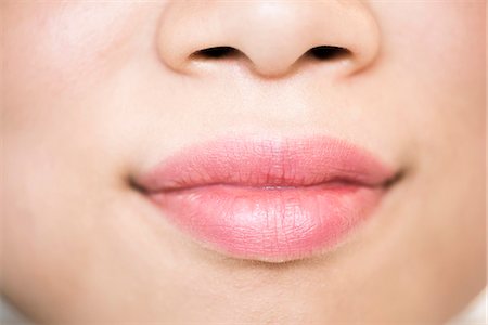 simsearch:633-05402118,k - Close-up of woman's lips Photographie de stock - Premium Libres de Droits, Code: 633-08482171