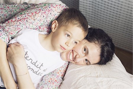 Mother embracing young son, portrait Stock Photo - Premium Royalty-Free, Code: 633-08638976