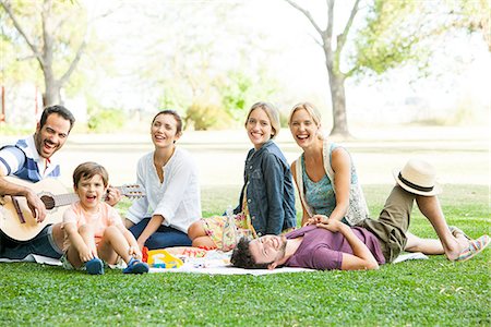Friends relaxing together in the park Stock Photo - Premium Royalty-Free, Code: 633-08726263