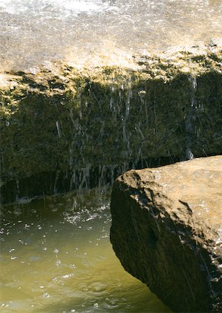 simsearch:696-03400450,k - Water flowing over edge of stone block Stock Photo - Premium Royalty-Free, Code: 633-01274015