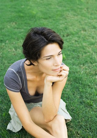 decollete - Woman sitting in grass Stock Photo - Premium Royalty-Free, Code: 633-01274316