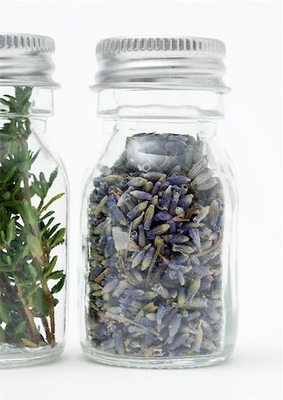Bottles of dried flowers and herbs Stock Photo - Premium Royalty-Free, Code: 633-01274509